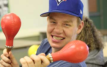 A happy client playing music